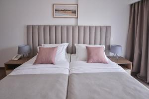 Letto o letti in una camera di Magnolia Place