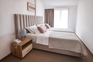Letto o letti in una camera di Magnolia Place