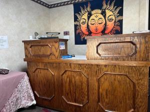 Postel nebo postele na pokoji v ubytování Sunrise Motel