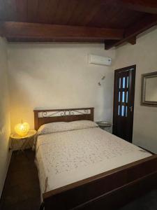 Ένα ή περισσότερα κρεβάτια σε δωμάτιο στο Alla villa di Angelo +55 φωτογραφίες