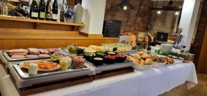 a buffet table with many different types of food at Gasthof zum Schiff in Obereisenheim