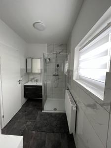 a bathroom with a shower and a sink at S&D in Kapfenberg