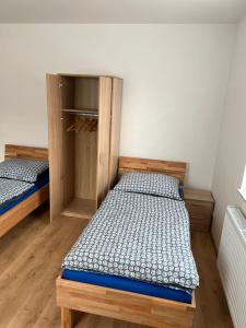 Ein Bett oder Betten in einem Zimmer der Unterkunft S&D