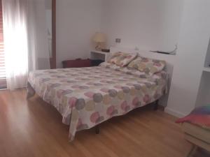 A bed or beds in a room at Sol-Paraíso