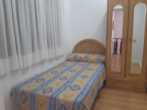 A bed or beds in a room at Sol-Paraíso