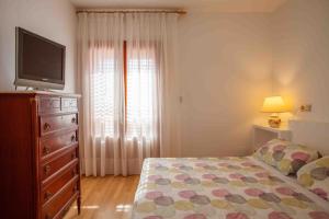A bed or beds in a room at Sol-Paraíso Még 27 kép