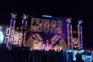 a group of people standing in front of a building with lights at Pertinho do Rio in Ponte de Lima