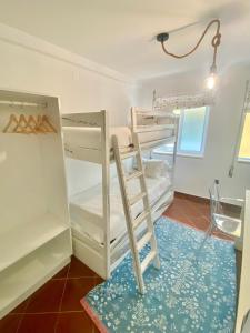 Postel nebo postele na pokoji v ubytování A Berlenga 3