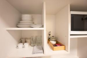 Telewizja i/lub zestaw kina domowego w obiekcie Central living - Stephansdom Apartments