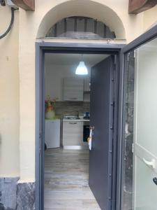 Virtuvė arba virtuvėlė apgyvendinimo įstaigoje SWEET HOME - tra Vesuvio, Sorrento e Napoli