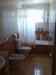 Ванна кімната в Banos de Europa Apartments