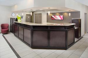 a large kitchen with a large island in a room at Residence Inn Portland Scarborough in Scarborough