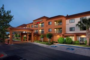 a rendering of a hotel with a parking lot at Courtyard by Marriott Brownsville in Brownsville