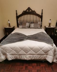 Giường trong phòng chung tại Silvia's House