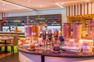 a display of glasses on a table in a store at Madrid Marriott Auditorium Hotel & Conference Center in Madrid