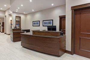 a lobby with a hair salon with a reception desk at Residence Inn by Marriott Seattle Sea-Tac Airport in SeaTac