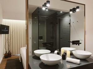 Uma casa de banho em Alto do Ferrum - Boutique Villa