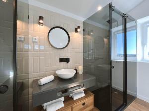 Uma casa de banho em Alto do Ferrum - Boutique Villa