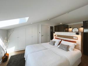 Uma cama ou camas num quarto em Alto do Ferrum - Boutique Villa