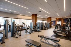 a gym with treadmills and elliptical machines at Houston Airport Marriott at George Bush Intercontinental in Houston
