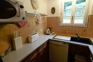 Kuchyň nebo kuchyňský kout v ubytování Gîte du Windstein + 21 fotografií