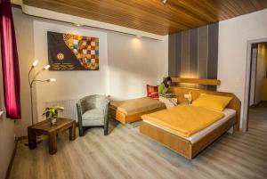 Llit o llits en una habitació de Boardinghouse Remchingen Baan Arun