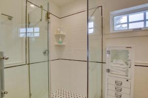 a shower with a glass door in a bathroom at Historic Albion Mountain Cottage on Quiet Street! in Albion