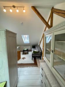 a living room with a vaulted ceiling at Zentrale Idylle in Kempten in Kempten