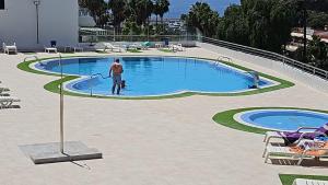 Bazén v ubytování Residencial Sol Suite 2 nebo v jeho okolí