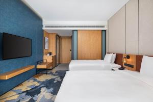 Katil atau katil-katil dalam bilik di Four Points by Sheraton Shanghai Jiading