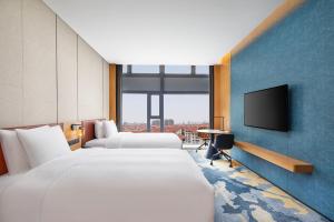 Katil atau katil-katil dalam bilik di Four Points by Sheraton Shanghai Jiading