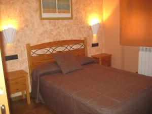 Postel nebo postele na pokoji v ubytování Hostal Guarni