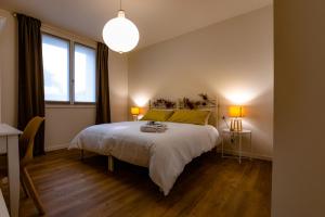 Postel nebo postele na pokoji v ubytování B&B Quattro Stagioni Charme and Wellness