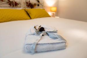 Postel nebo postele na pokoji v ubytování B&B Quattro Stagioni Charme and Wellness