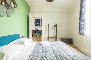 Posteľ alebo postele v izbe v ubytovaní F3 Grand Luxe Champfleuri (B)