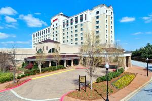 a large white building with a circular driveway at Spartanburg Marriott in Spartanburg