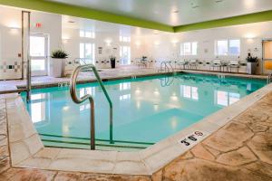 a large swimming pool in a hotel at Fairfield by Marriott Wilkes-Barre in Wilkes-Barre
