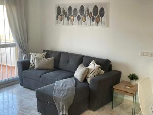 A seating area at Beautiful apartment at La Marquesa Golf Quesada