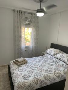 A bed or beds in a room at Beautiful apartment at La Marquesa Golf Quesada Még 13 kép