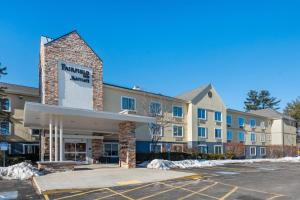 a rendering of the front of a building with a parking lot at Fairfield by Marriott Inn & Suites Portland Maine Airport in Scarborough