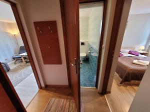 Łóżko lub łóżka w pokoju w obiekcie Ośrodek Wypoczynkowy Romed
