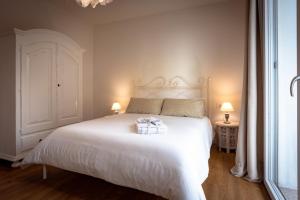 Postel nebo postele na pokoji v ubytování B&B Quattro Stagioni Charme and Wellness