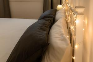 Postel nebo postele na pokoji v ubytování B&B Quattro Stagioni Charme and Wellness
