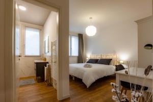 Postel nebo postele na pokoji v ubytování B&B Quattro Stagioni Charme and Wellness