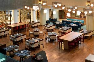 an overhead view of a restaurant with tables and chairs at Marriott Columbia in Columbia