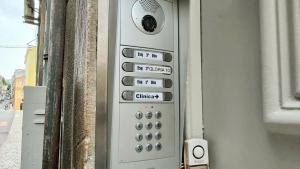 a remote control on the side of a building at Glória 10 in Lisbon