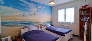 Posteľ alebo postele v izbe v ubytovaní Baleiniers - Maison 6 pers - prox mer - Les sables