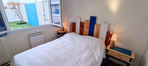 Posteľ alebo postele v izbe v ubytovaní Baleiniers - Maison 6 pers - prox mer - Les sables