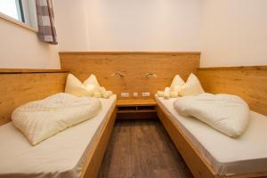 Postel nebo postele na pokoji v ubytování Apparthotel Panorama