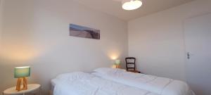 Posteľ alebo postele v izbe v ubytovaní Valparaiso-Vue Mer-2 ch-Garage-Sables d olonne
